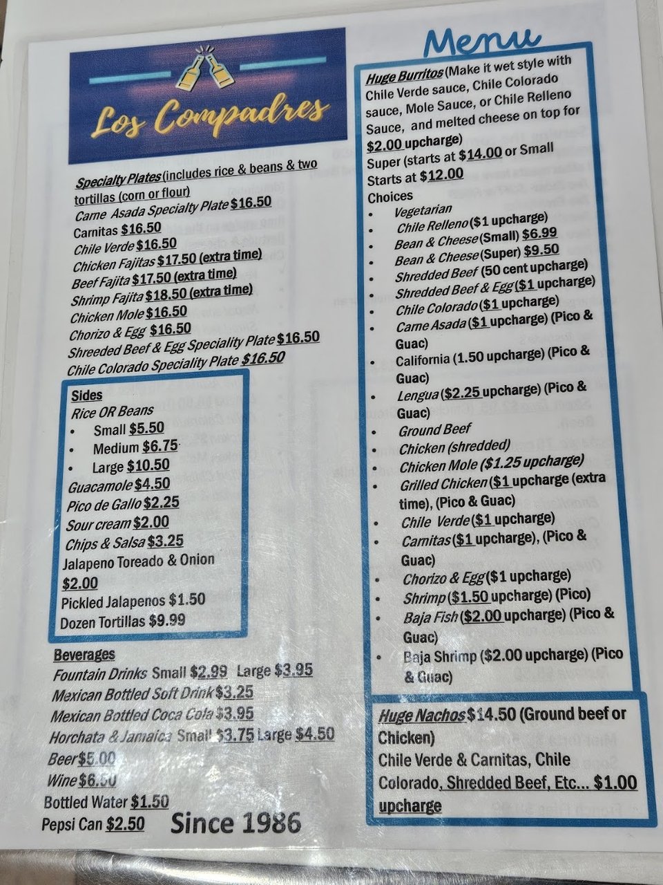 Close-up of a restaurant menu with Mexican dishes.